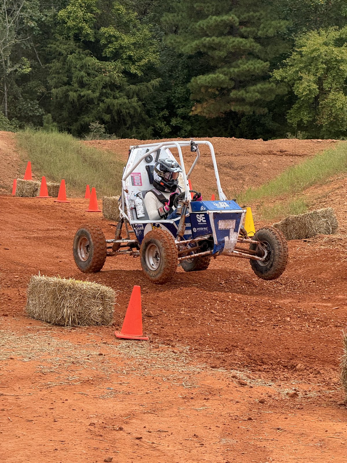Oregon Tech Racing Baja team — Matthew Haines, Cliff Stover, Owen Haugh, and Wyatt Rasor